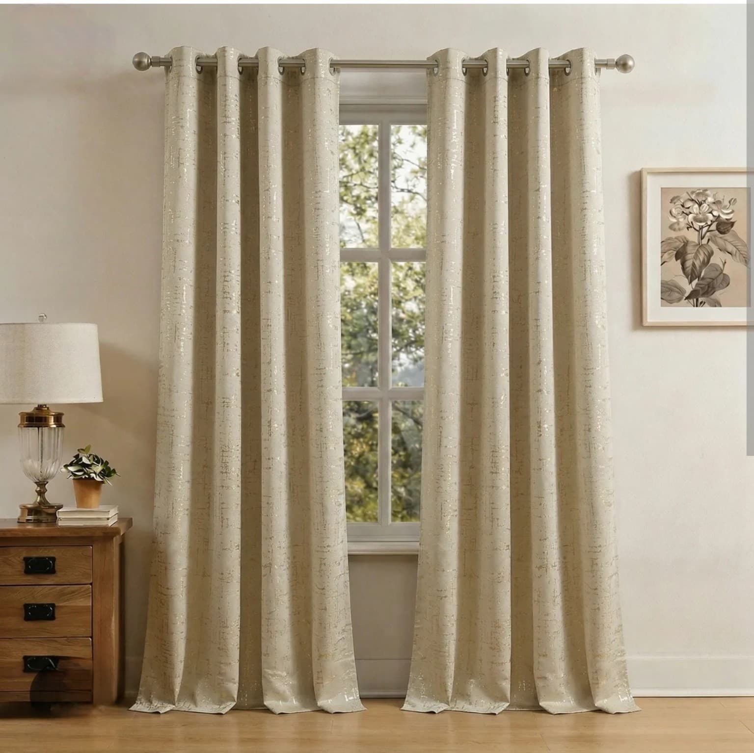 Soft sheer curtains catching natural light in a styled bedroom